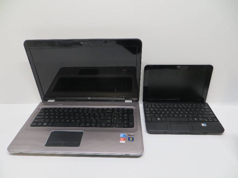 lot 1211 image: Lot of 2 laptops, HP pavilion dv7, intel core i5 m480  2.67ghz, 4gb ddr3, 500gb hdd, windos 7 hp, and HP compaq mini 102, intel atom no hdd or ram