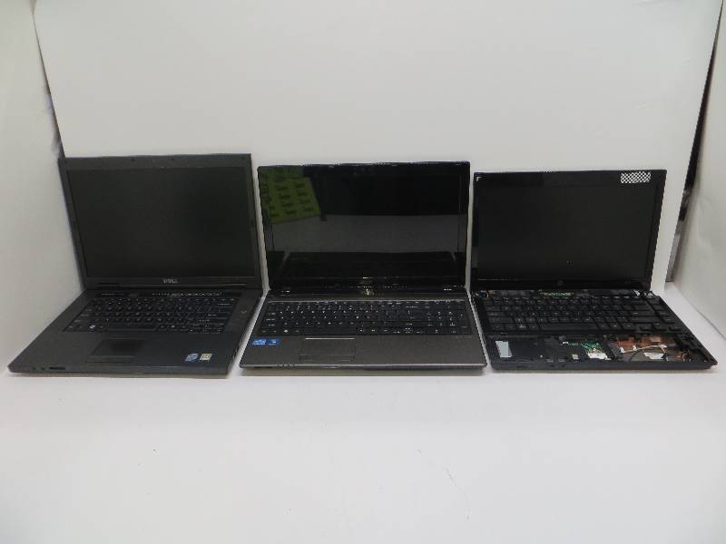lot 1212 image: Lot of 3 laptops Acer aspire 5750, intel core i5, 4gb ddr3, 250 gb hdd, windows 7 hp, Dell vostro 1520, intel core 2 duo, no hdd or ram, HP 4410t, unknown hdd or ram