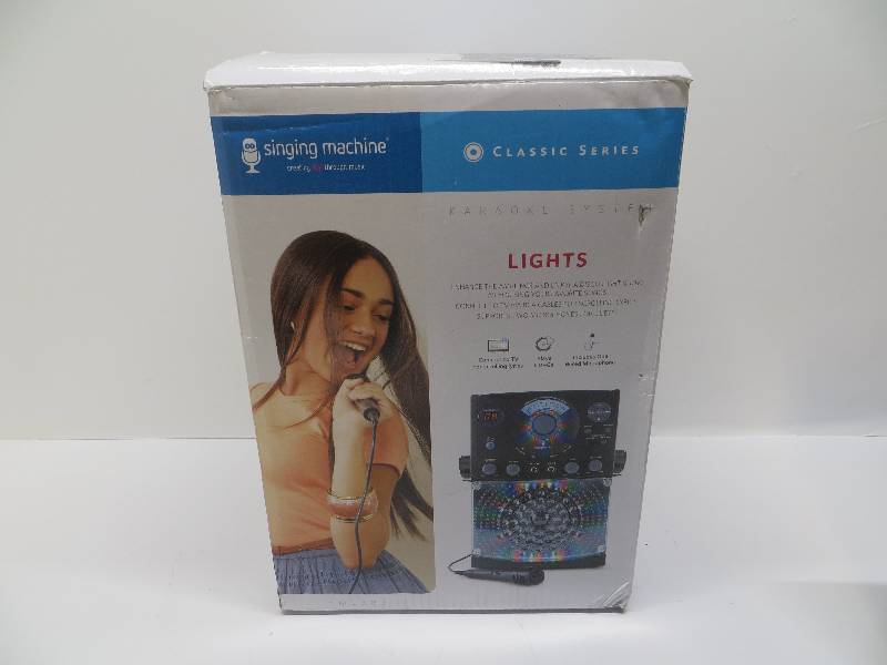 lot 1213 image: Singing machine karaoke system model SML385 (no output)