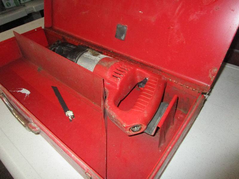 lot 1052 image: Milwaukee Sawzall w case no cord
