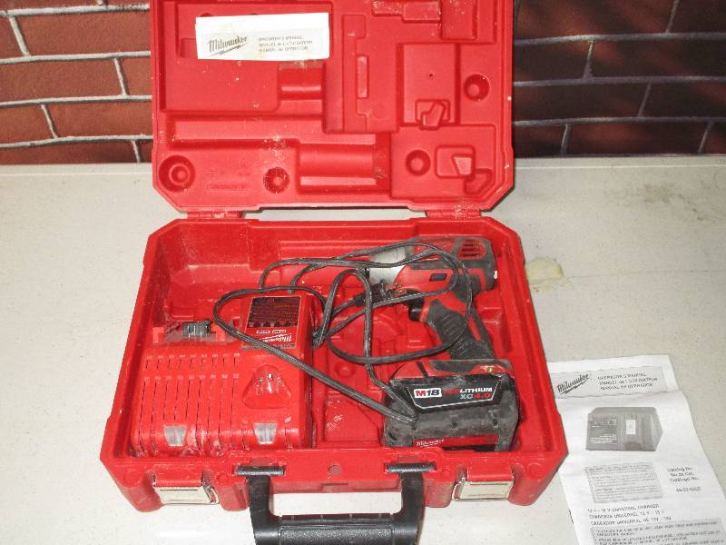 lot 1057 image: Milwaukee Power Drill w Case and Battery Charger