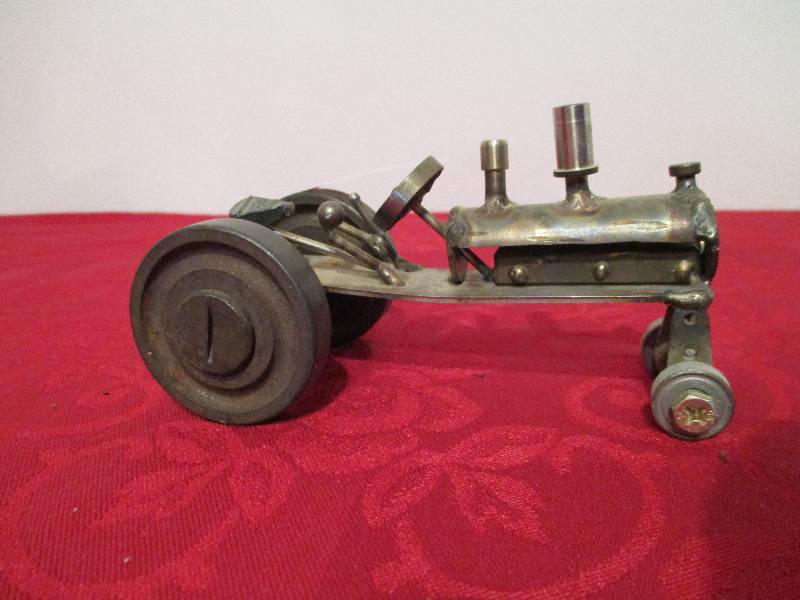 lot 1013 image: Handmade Metal Tractor