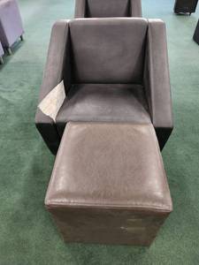 lot 48776 image: Stainless Steel And Black Faux Leather Accent Chair And Brown Leather Ottoman