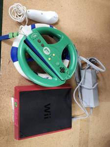 lot 48671 image: Nintendo Wii Mini And Controllers Model RVL-201