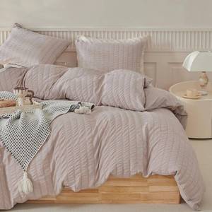lot 1029 image: WARMDERN Duvet Cover Set Queen Size, 3pcs Washed Microfiber Khaki Bedding Set, Soft Breathable Striped Textured Seersucker Duvet Cover with Zipper Closure & Corner Ties(Khaki, Queen) Retail $27.99