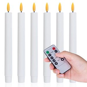 lot 1104 image: BeMoment Flameless Taper Candles Flickering with Remote Timer, 9.8 Inches Real Wax Battery Operated LED Candlesticks, 3D Flickering Window Candles for Party Decor Retail $10.53