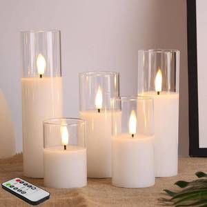 lot 1241 image: Eywamage 5 Pack Clear Glass Flameless Candles with Remote, Flickering Slim Tall LED Pillar Votive Candles Battery Included Retail $37.49