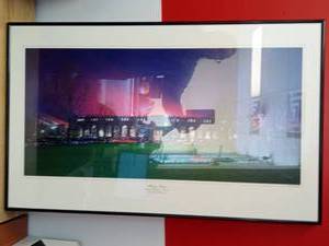 lot 1008 image: Memorial Stadium By Rick Anderson Framed 34.25 x 21.25 Black metal frame