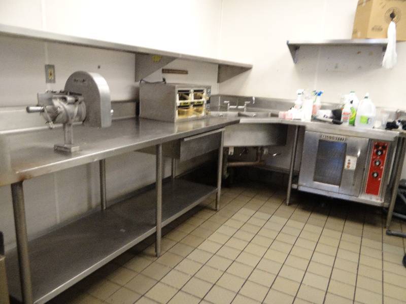 lot 2551 image: Fully Stainless Corner Sink With Under storage and Slice Chief