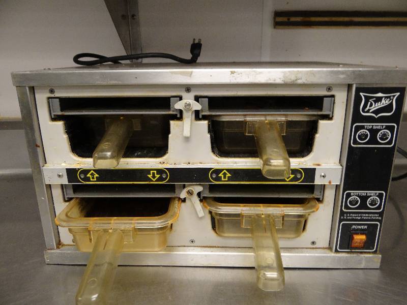 lot 2552 image: Duke Product Holding Cabinet