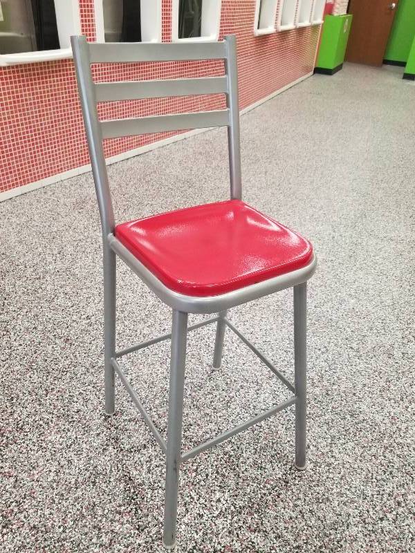 lot 1025 image: Metal framed barstool with red seat