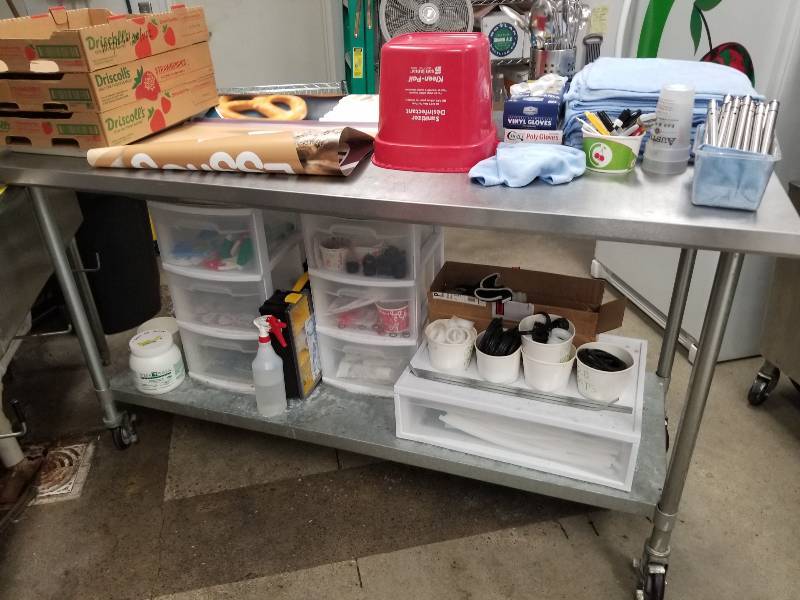 lot 1080 image: 72x30 stainless table on wheels