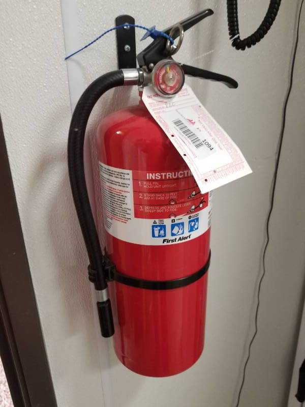 lot 1094 image: ABC wall mount fire extinguisher