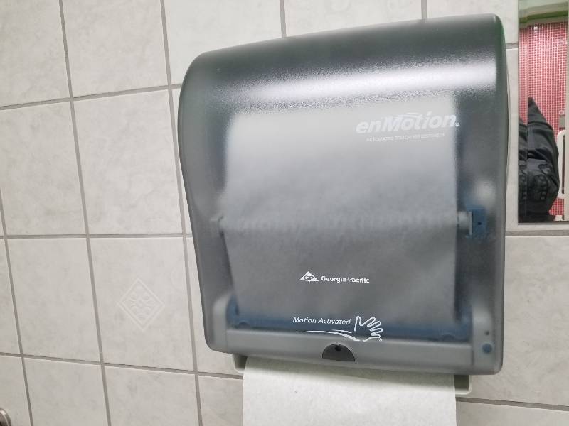 lot 1099 image: EnMotion paper towel dispenser and trash can