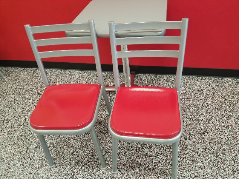 lot 1021 image: Lot (2) metal framed chairs with red seat