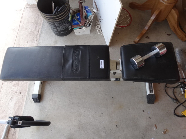 lot 101 image: Nautilus WorkoutWeight Bench & 2 - 10lb. hand weights.
