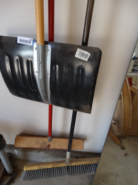 lot 106 image: 2 Push Brooms & Snow Shovel - on wall rack.