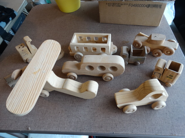 lot 164 image: Box of Handmade Wood Toys.