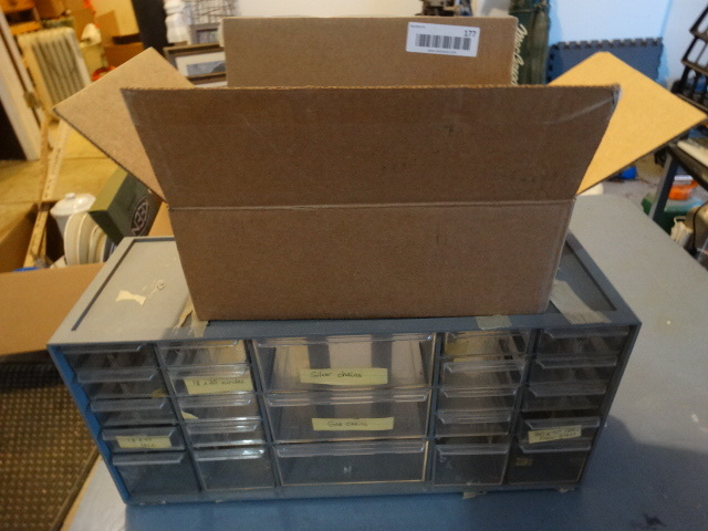 lot 177 image: Parts Bin & Box wDrill Bits, Sanding Blocks, Tools, & Light Bulbs.