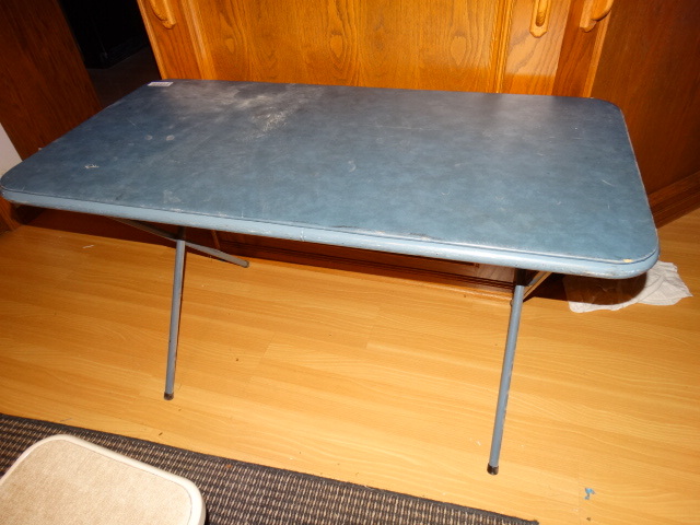 lot 208 image: Blue Folding Table.