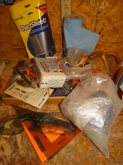 lot 223 image: Lot of Gloves, Tape, Staples, Woodworking Tools, & Cleaning Supplies.