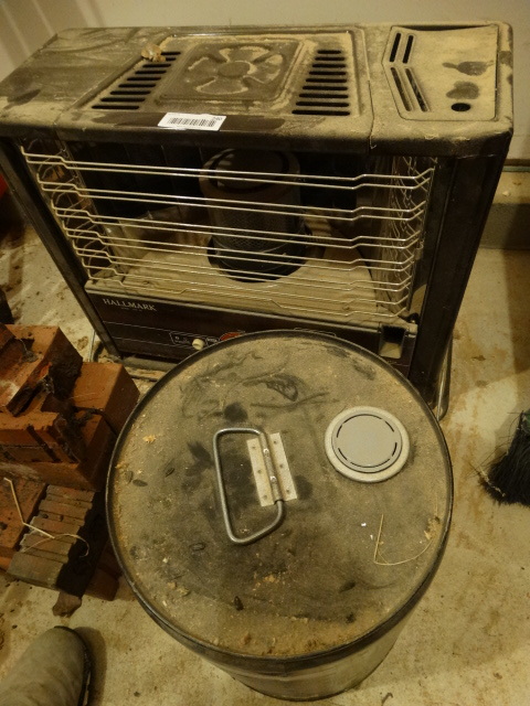 lot 240 image: Hallmark Shop Heater & Full 5 Gallon Can of Kerosene.