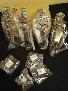 lot 1037 image: 4 Set Christmas Stocking Holder for Mantle with String Fairy Lights Battery Operated No Slip Stocking Hanger Stocking Hooks LED String Lights for Christmas Party Fireplace Home Decorations (Antique Brass) Retail $21.99