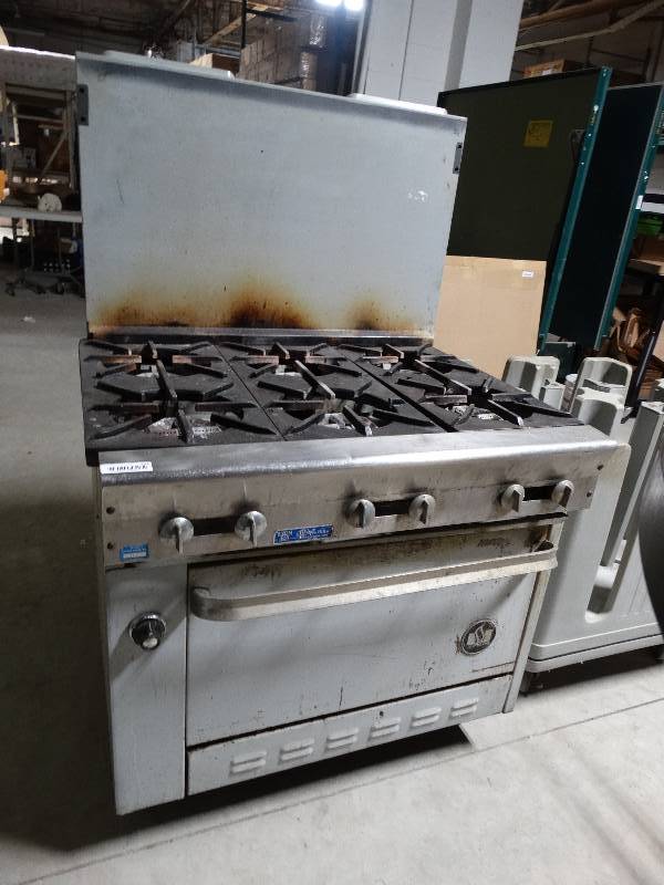lot 251 image: U.S. Range commercial 6 burner gas range w oven