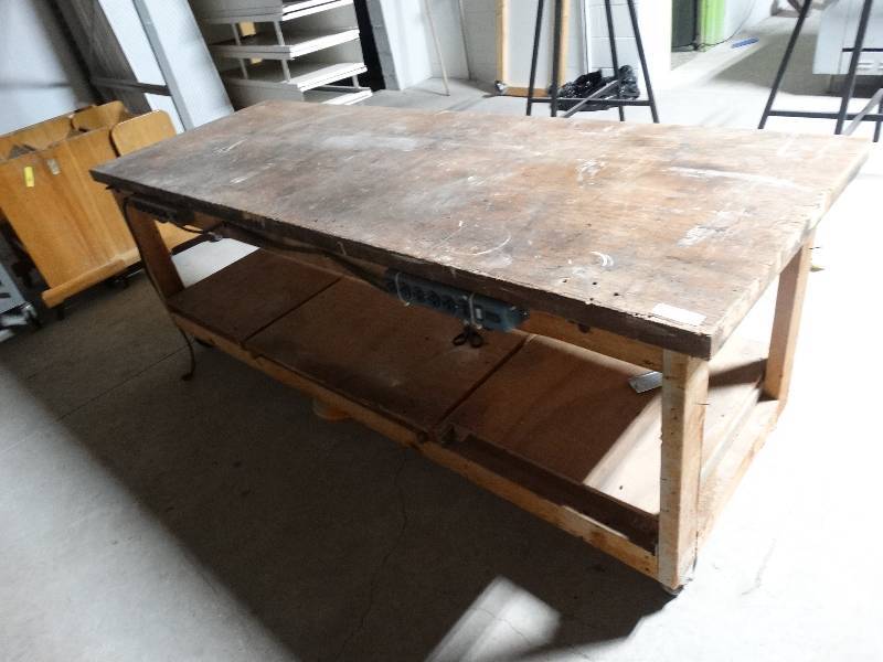 lot 296 image: Shop table on wheels w power outlets