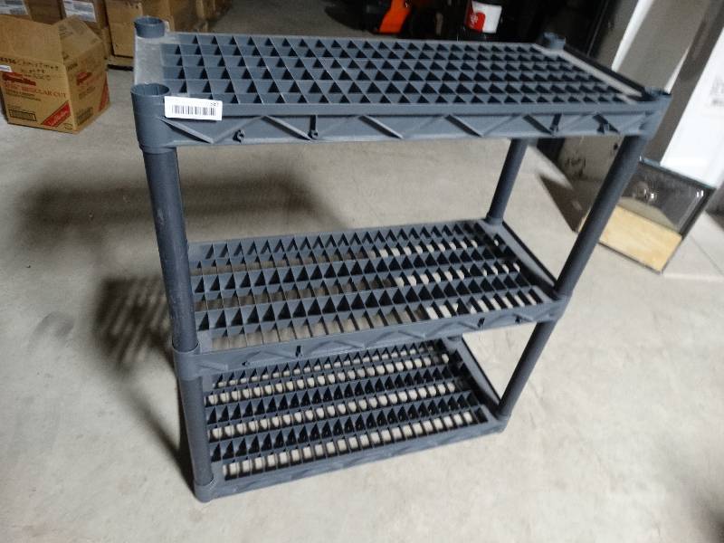 lot 297 image: Plastic shelving unit