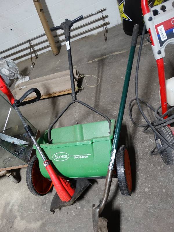 lot 390 image: Lawn spreader weed eater shovel