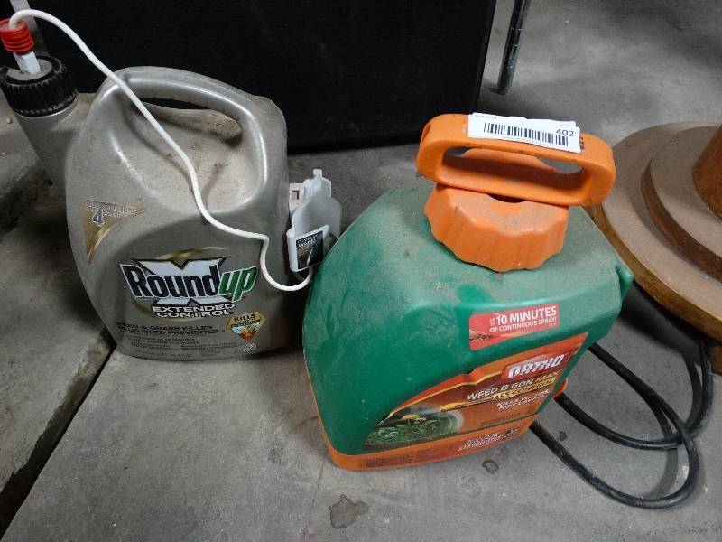 lot 402 image: 2 partial gallons of weed killer