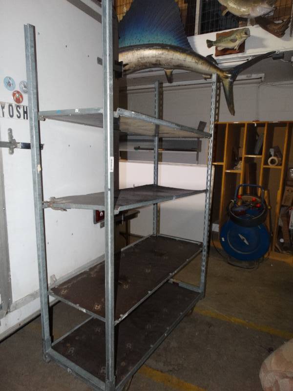 lot 4443 image: 4 shelf rolling rack- comes apart for storage