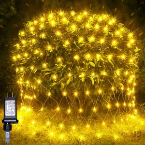 lot 21840 image: HeKation Christmas Net Lights Outdoor for Bushes, 200 Led Net Lights Outdoor Mesh Lights for Tree, Party, Wedding (9.8x6.6, Plug in, Warm White)