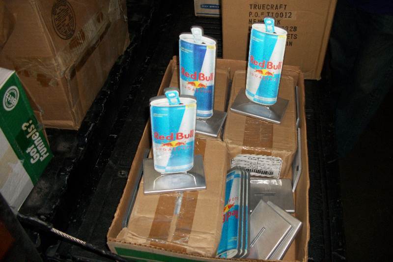 lot 9179 image: case of red bull table displays