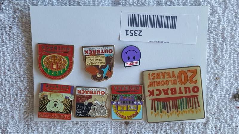 lot 2351 image: Lot of Outback Steakhouse Collector Pins