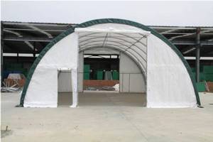 lot 250 image: Unused Galvanized Trussed Round Storage Shelter Model 304015R - W30xL40xH15 For Warehouses, Carport, Event and Exhibition Tents, Garages for Trucks, Buses, Vans, and Boats, Freight Warehouses, Commercial Tents and More