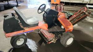 lot 25 image: Jacobsen Textron Tri-King 1900D Riding Reel Mower 3 Wheel All Wheel Drive - Kubota Diesel, D-662, 3 cyl. liquid cooled, 19 hp engine, 8.5mph -  Three(3) 30 Reels w 7 Blades Each With Overall Cut of 86 Retail Price $22,500 Used $11,500