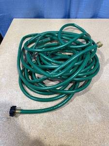 lot 1912 image: FLEXON 58-in x 25-ft Light-Duty Vinyl Green Hose.