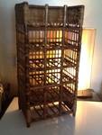 Very nice 36 inch tall wicker style wine rack great  Decour pieces