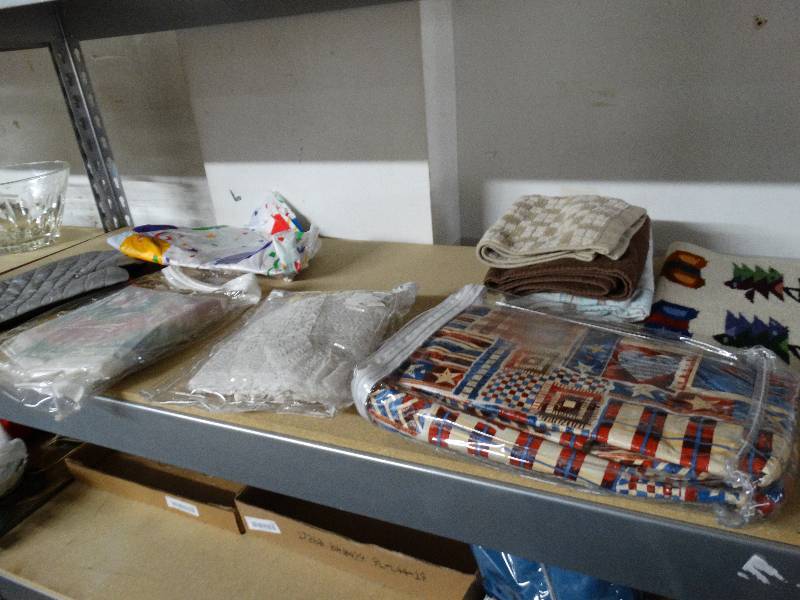 lot 749 image: Lot of assorted kitchen towles, table cloths & kitchen mit.