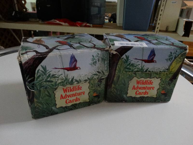 lot 773 image: 2 Boxes of wild life adventure cards.