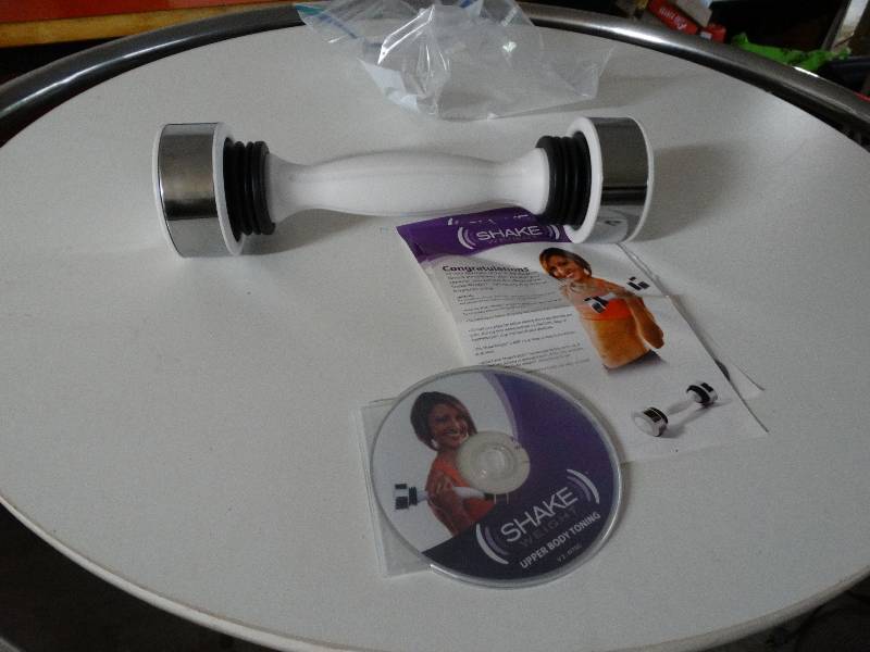 lot 790 image: Shake weight and CD.