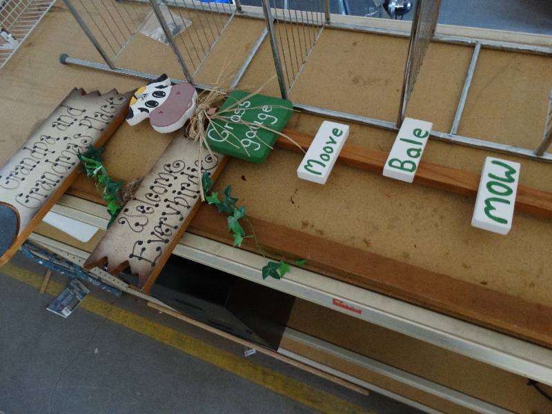 lot 832 image: wooden decorative yard signs.