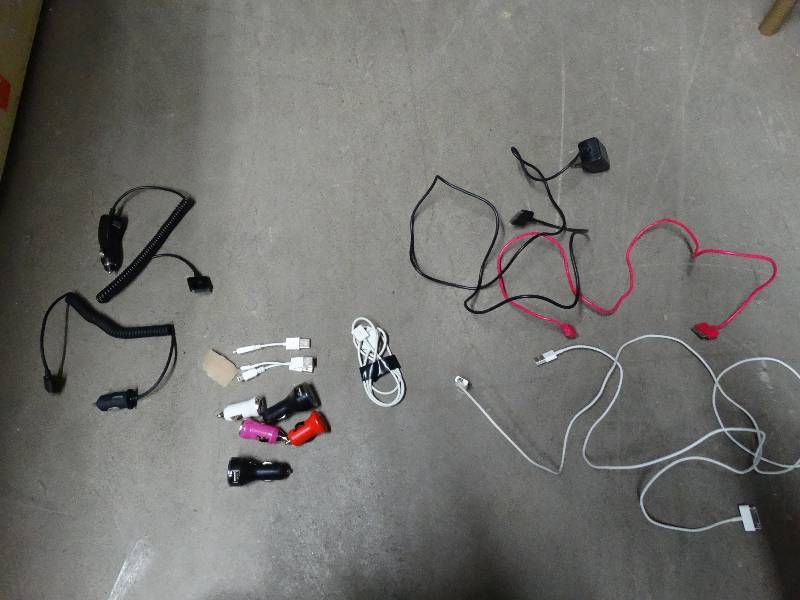 lot 844 image: Lot of Iphone chargers and car chargers.