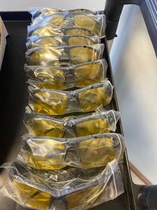 lot 2237 image: Yellow tinted safety glasses (10) pair individually wrapped