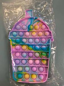 lot 2256 image: Rainbow pop it Purse toy