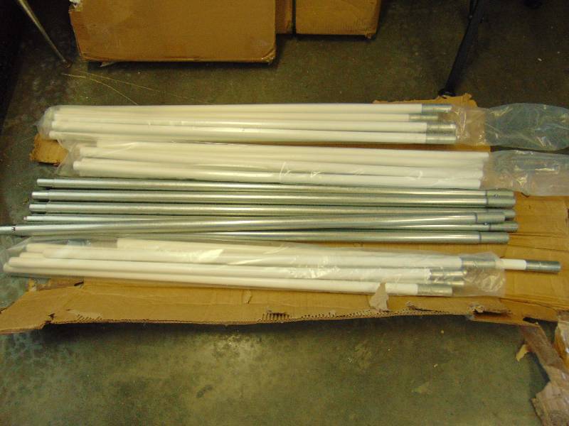 lot 7001 image: (24) ct. lot poles (6) telescoping aluminum poles- adjusts upto 8 long, (12) PVC w. aluminum end 44 long, (6) PVC 44 long