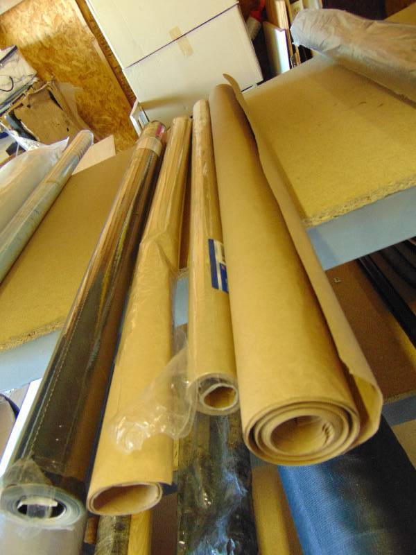 lot 7033 image: (4) rolls Kraft butcher paper, assorted lengths