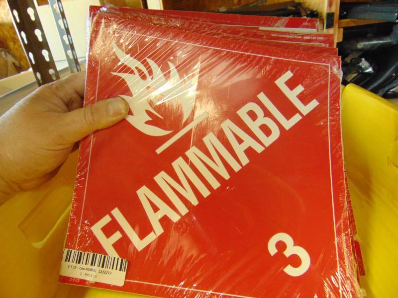 lot 7053 image: (4) packages flammable DOT stickers, 25 per package, adhesive back, 10-34 x 10-34, (4 x 25100)